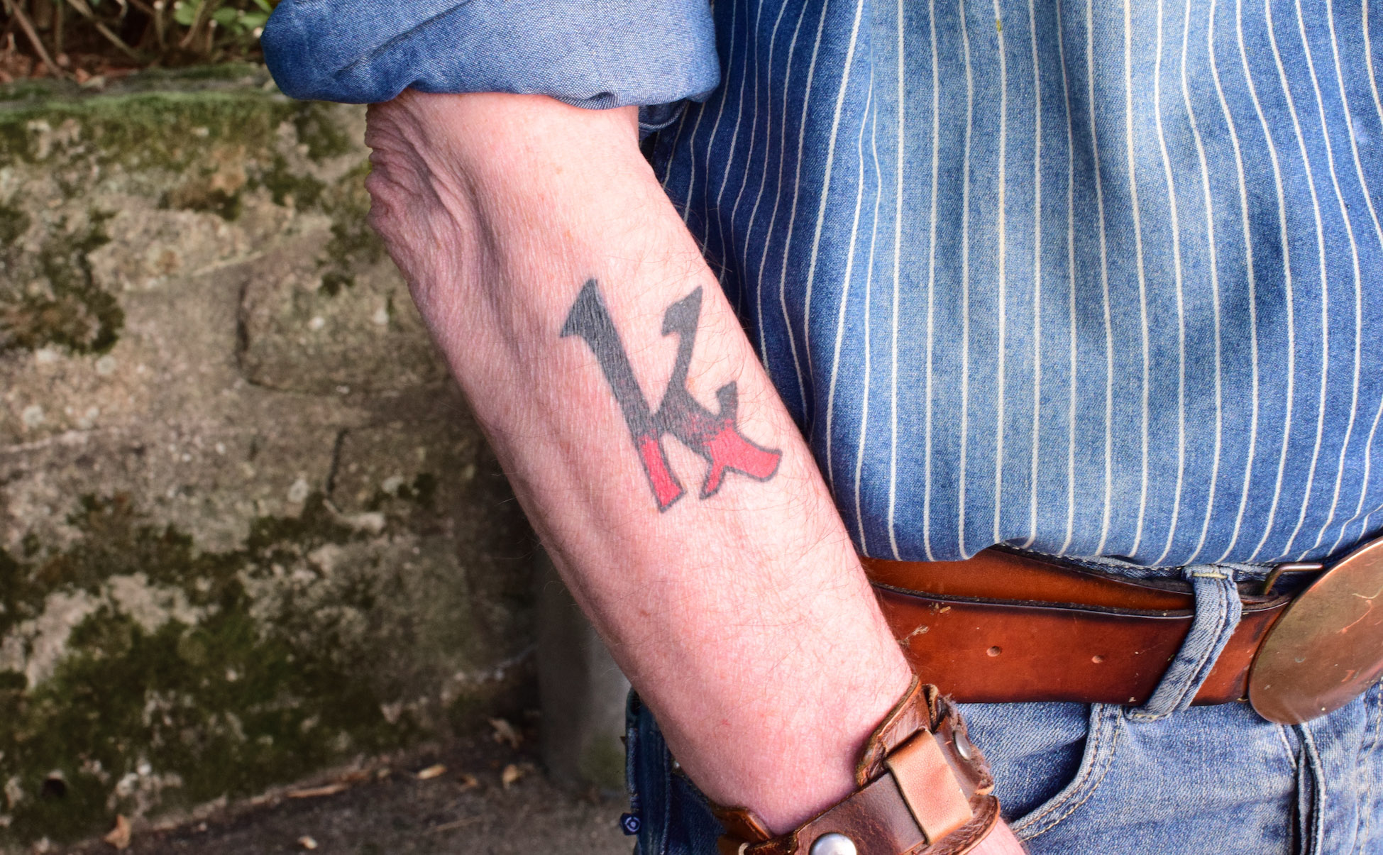 tatouage K barree Dom Duff